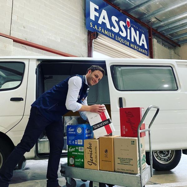 Adam Fassina loading a truck for deliveries during COVID-19 crisis